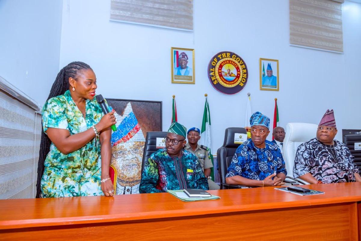 Prof. Chinwe Obuaku-Igwe presenting at an official government briefing attended by the Governor of Osun State and senior officials