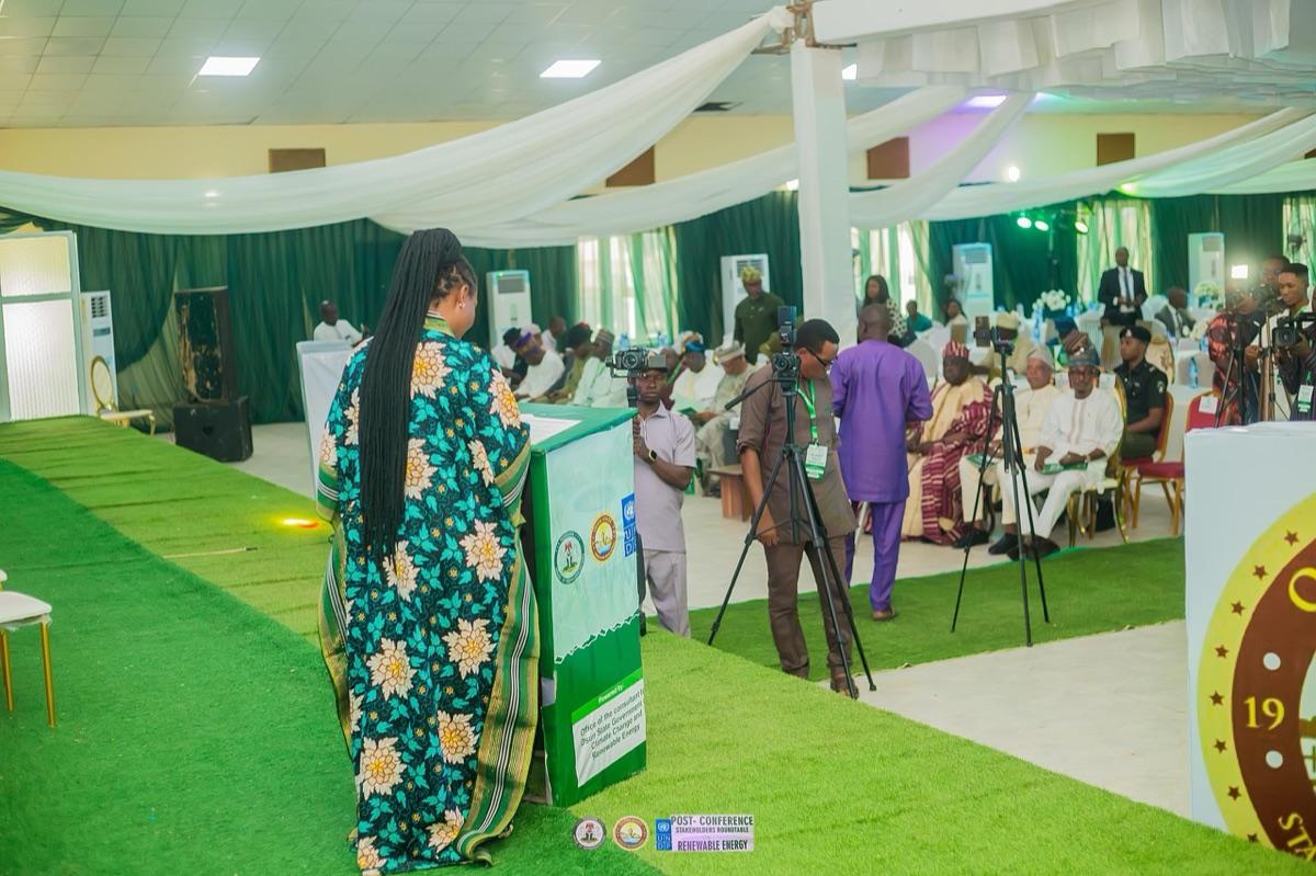 Prof. Chinwe Obuaku-Igwe at the podium of a major green summit conference, speaking on Osun State's climate action programmes